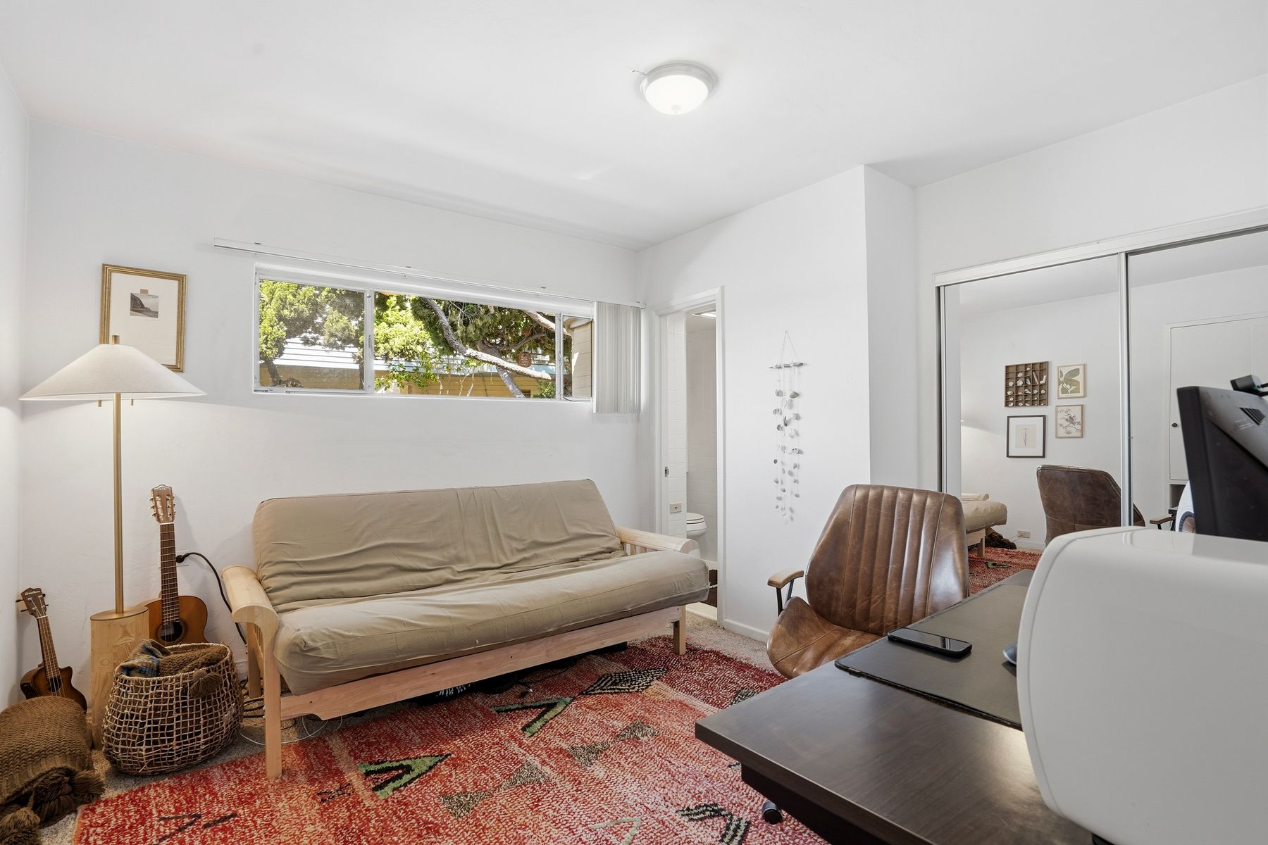Living space with natural light from corner-lot windows